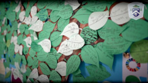 Bishop Challoner School kindness wall with handwritten leaves carrying messages from pupils including “Be Kind”