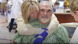Steffanie Strathdee embracing her husband after life-saving phage therapy treatment