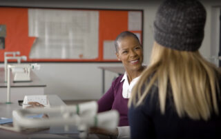 Josette Simon OBE smiling during an equality and diversity training video for ted Learning, filmed by WIDEO.co.uk.